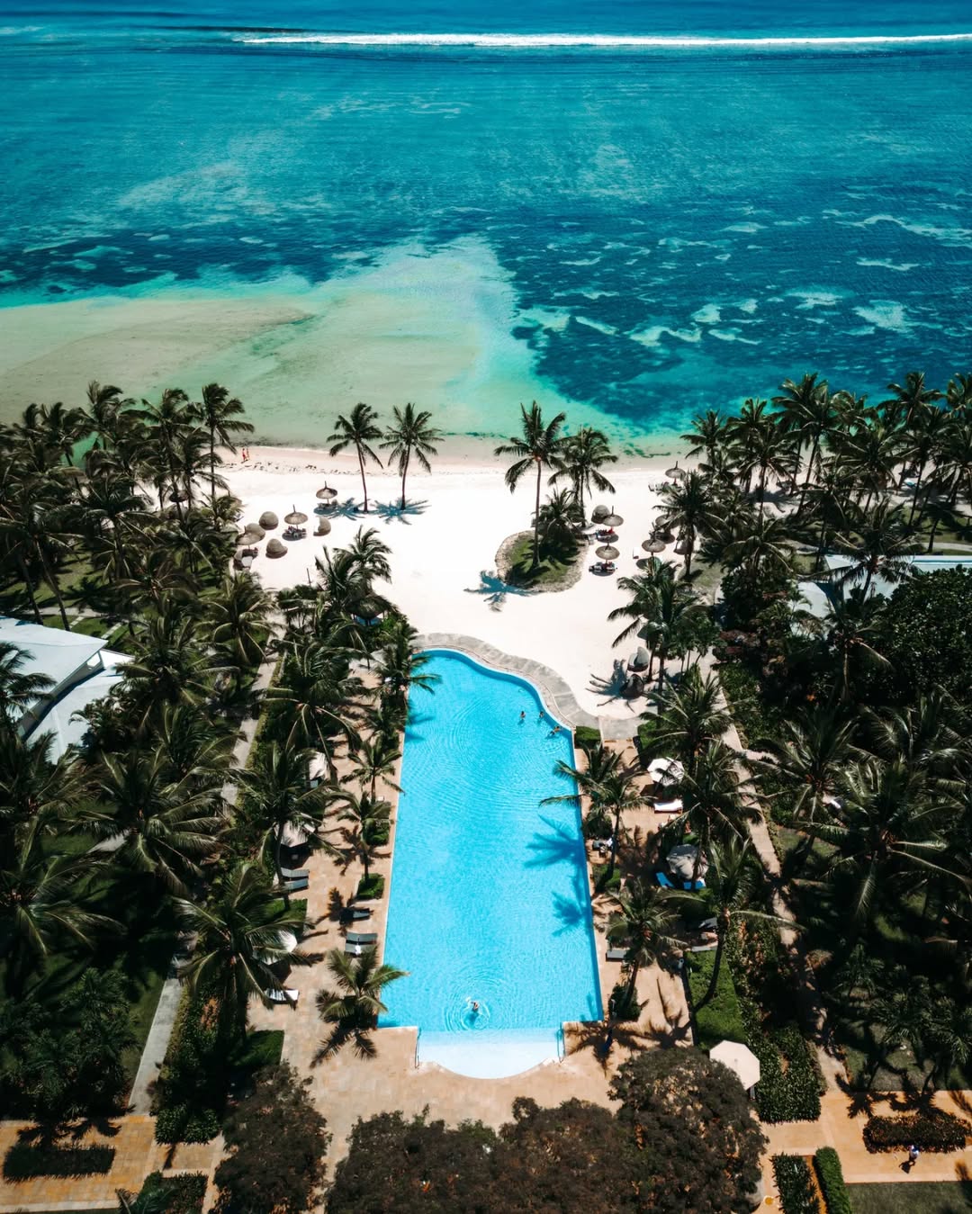 Se baigner dans la piscine ou dans la mer au Sugar Beach Mauritius ? © uros_podlogar_photography